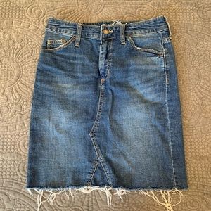 Jean skirt that fits right before knees.